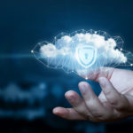 Hand_shows_a_data_cloud_with_a_protective_shield._The_concept_of_data_protection